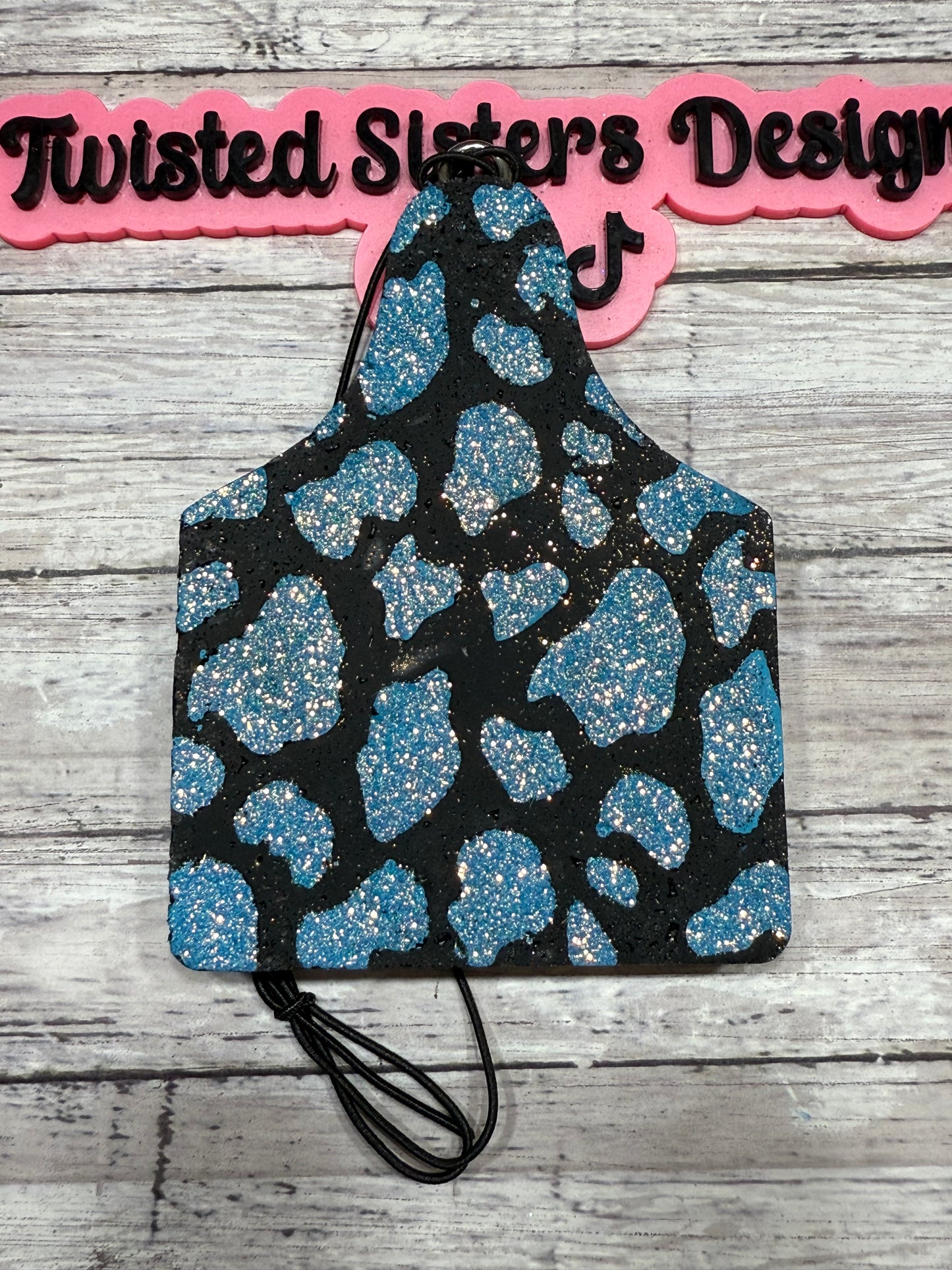 Cheetah Cow Tag.
